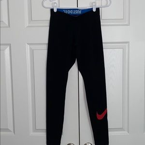 Nike leggings with blue USA logo & red Nike check